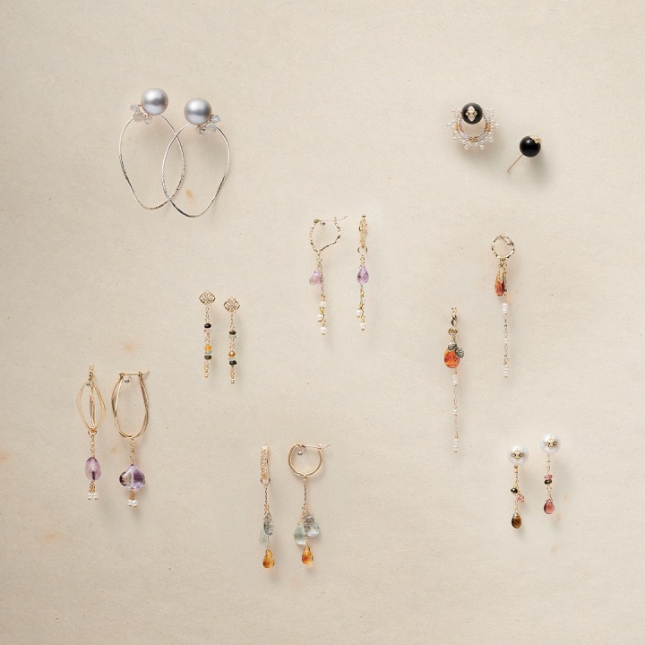 pierced earrings / charm